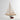 A photo of a white Grove Pond free sailing model sailboat on a stand.