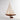 A photo of a wood Grove Pond free sailing model sailboat on a stand.