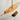 A photo of a white wood Grove Pond free Sailing model sailboat looking at the deck