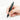 A photo of a black Penco pencil in a person's hand drawing