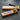 A photograph of a drafting pencil and a drafting pen together in their gift boxes