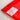 A photo detail of a Peter Powell hand written serial number label in red.