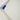 A photo of a corner detail of the corner of a peter power stunt kite in white with blue