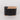 A photo of a ranica mir 6-4 pinhole camera in black from a three quarter view.